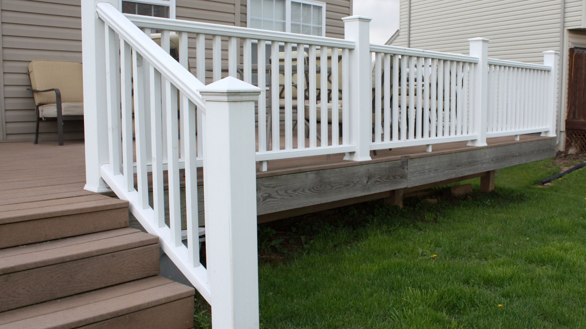 Deck railing and stair finish detail on completed project